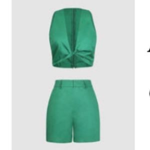 Green v neck top and short set.